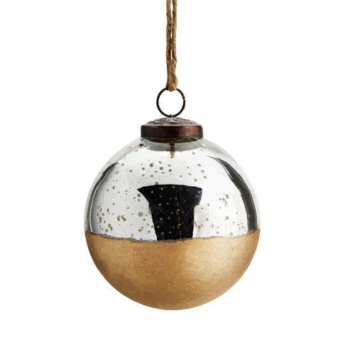 Bombka z srebrno-złotą dekoracją imitującą spadający śnieg